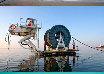 An operator works during the mooring of an undersea fiber optic cable at Arrietara beach near the Spanish Basque village of Sopelana on June 13, 2017. Facebook and Microsoft have paired up to run a giant underwater cable dubbed Marea (tide) that will stretch from Virginia in the US to Bilbao, Spain, crossing some 6,600 kilometers of ocean. (Photo by ANDER GILLENEA / AFP) (Photo by ANDER GILLENEA/AFP via Getty Images)